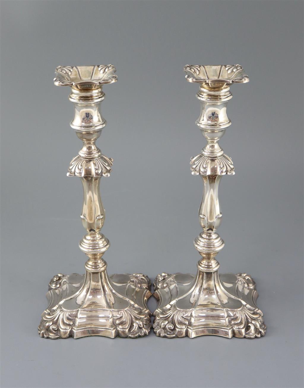 A pair of Edwardian silver candlesticks by William Hutton & Sons,